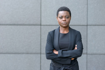 Stern serious young black businesswoman