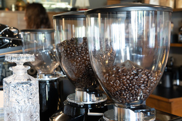 View of Coffee grinder with bean in storage for waiting crush.