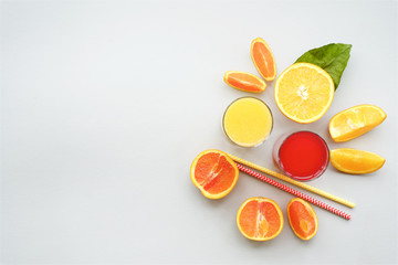 juice, orange, red, orange, citrus, Sicilian, vitamin, refreshing, fresh, squeezed, drink, view from above, traditional, summer, spring, bright, mint background, wooden table, empty space, minimalism,