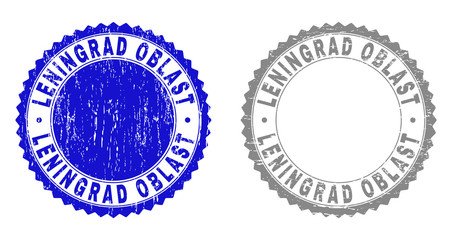 Grunge LENINGRAD OBLAST stamp seals isolated on a white background. Rosette seals with grunge texture in blue and gray colors. Vector rubber watermark of LENINGRAD OBLAST title inside round rosette.