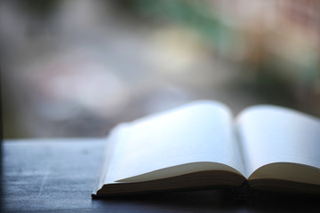 open book and a table