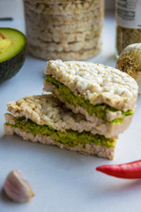 Rice cake with cream cheese and avocado.Vegan Food
