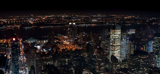 Amazing NYC panoramic night aerial view. Manhattan district. USA