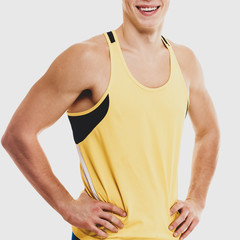 part of handsome smiling muscular sportsman posing on white background