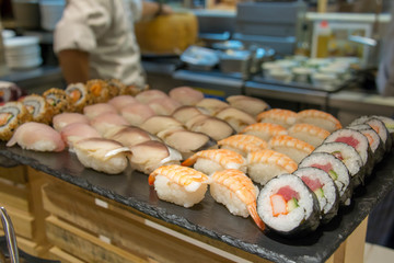  sushi roll on buffet in japanes restaurant