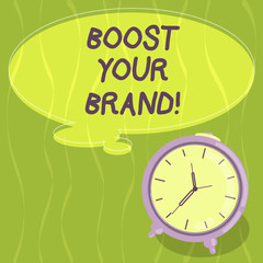 Writing note showing Boost Your Brand. Business photo showcasing describe high levels of overall customer satisfaction Blank Color Thought Speech Bubble with Outline and Alarm Clock photo
