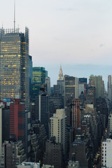 Fototapeta na wymiar Aerial and panorama view of skyscrapers of New York City, Manhattan. Top view of night midtown of Manhattan