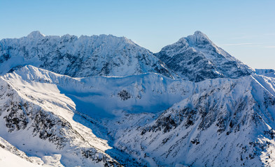 An outstanding peak in the High Tatras - Krywan (Krivan) and Hrube ridge in winter scenery.