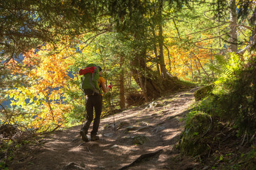 A great warm autumn in France in the Alpine mountains on tourist paths with magnificent views around.