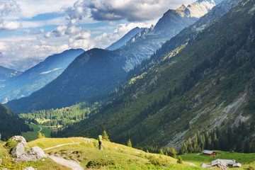 A great warm autumn in France in the Alpine mountains on tourist paths with magnificent views around.