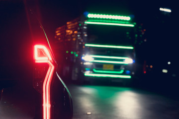 Cars on the road heading towards the goal of the trip, Urgent traffic in the night.