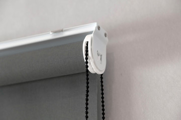 close up detail of a roller blind of a window
