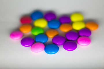 Gems chocolate candy with white background 