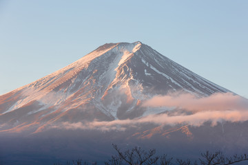 closeup view of Fuji mountain with sunlight of sunrise in the morning scene in Japan