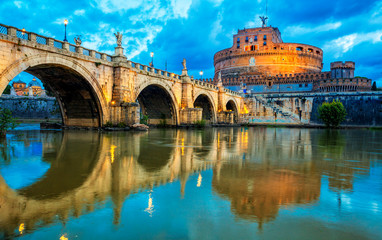 Naklejka na ściany i meble Bridge and Castle Sant Angelo in Rome. Sant Angelo bridge at twilight.