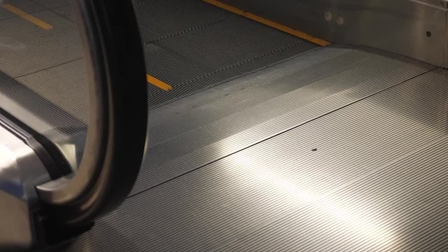 Business People Passing Feets throught travolator arriving airport