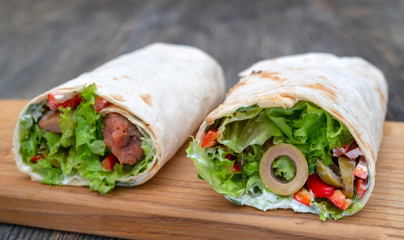 Fresh rolls with vegetables and meat.