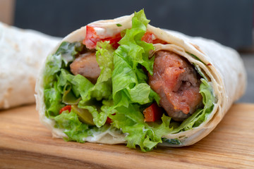 Fresh rolls with vegetables and meat.