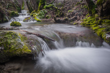 waterfall water stream with ice and frost