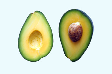 sliced avocado on white background
