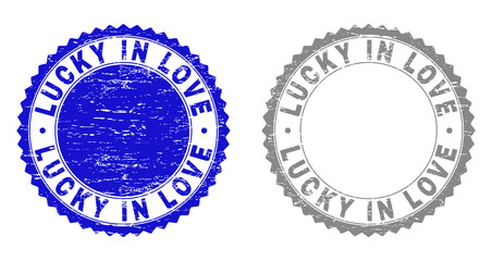 Grunge LUCKY IN LOVE stamp seals isolated on a white background. Rosette seals with grunge texture in blue and gray colors. Vector rubber stamp imitation of LUCKY IN LOVE label inside round rosette.