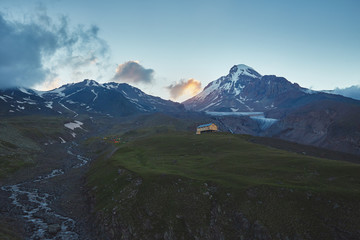 a lonely house landscape in caucasus mountains kazbek mountain