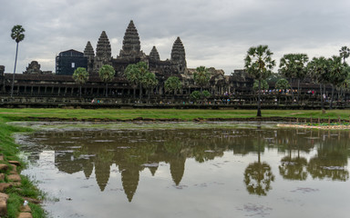 Fototapeta na wymiar The world famous Angkor Wat temple in the early morning on a gloomy day