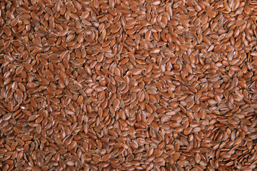 Flax seeds. Top view. Food Background. A scattering of flax seeds. Healthy food. Natural food.