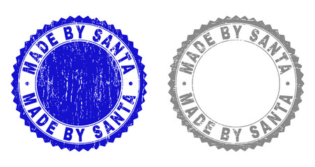 Grunge MADE BY SANTA stamp seals isolated on a white background. Rosette seals with grunge texture in blue and grey colors. Vector rubber stamp imitation of MADE BY SANTA text inside round rosette.