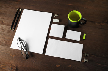 Blank corporate stationery on wooden background. Branding mock up.