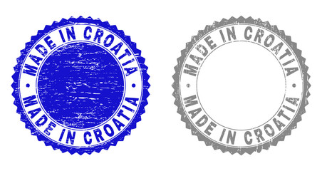 Grunge MADE IN CROATIA stamp seals isolated on a white background. Rosette seals with grunge texture in blue and grey colors.