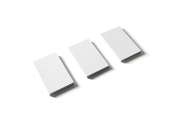 Three piles of blank business cards isolated on white background. Clipping path.