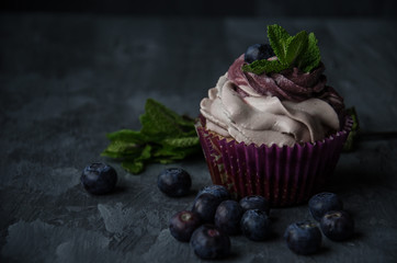 cupcakes with cream and berry