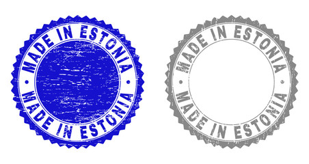 Grunge MADE IN ESTONIA stamp seals isolated on a white background. Rosette seals with grunge texture in blue and gray colors. Vector rubber overlay of MADE IN ESTONIA title inside round rosette.