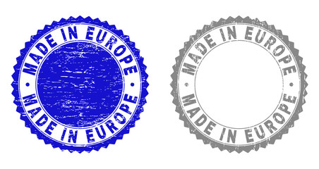 Obraz premium Grunge MADE IN EUROPE stamp seals isolated on a white background. Rosette seals with grunge texture in blue and grey colors. Vector rubber watermark of MADE IN EUROPE text inside round rosette.