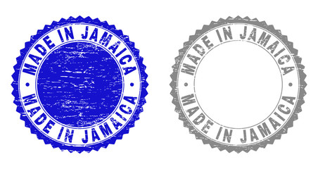 Grunge MADE IN JAMAICA stamp seals isolated on a white background. Rosette seals with distress texture in blue and grey colors. Vector rubber watermark of MADE IN JAMAICA caption inside round rosette.