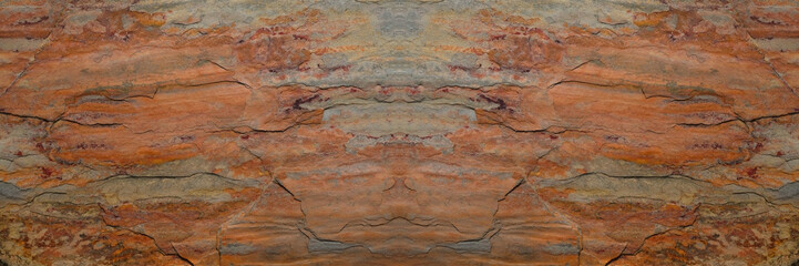 Rust stone wall in panorama view or grunge stone texture image use for stone background