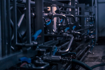 A pressure gauge inside of a beer plant brewery