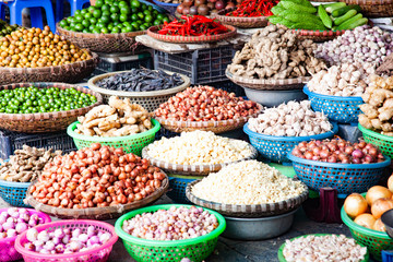 tropical spices and fruits sold at a local market in Hanoi (Vietnam)