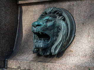 detailed statue, lion head at one of the obelisks in Rome, Italy