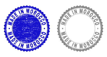 Grunge MADE IN MOROCCO stamp seals isolated on a white background. Rosette seals with grunge texture in blue and gray colors. Vector rubber stamp imprint of MADE IN MOROCCO tag inside round rosette.