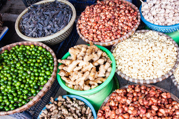 tropical spices and fruits sold at a local market in Hanoi (Vietnam)