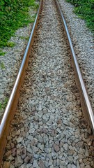 Obraz premium Railway and pebble beside