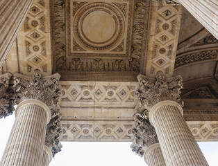 Columns of Pantheon - Paris seen from below. Pantheon was build by the architect Soufflot and among others Victor Hugo, Emile Zola and Voltaire are buried in the crypt