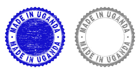 Grunge MADE IN UGANDA stamp seals isolated on a white background. Rosette seals with grunge texture in blue and gray colors. Vector rubber stamp imitation of MADE IN UGANDA tag inside round rosette.