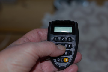  online banking--tan generator  hold by a hand