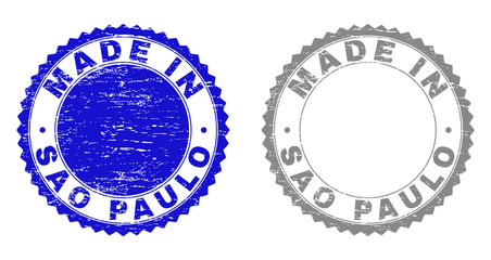 Grunge MADE IN SAO PAULO stamp seals isolated on a white background. Rosette seals with grunge texture in blue and grey colors.