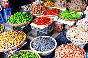 tropical spices and fruits sold at a local market in Hanoi (Vietnam)