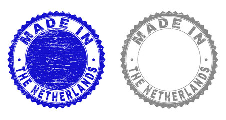 Grunge MADE IN THE NETHERLANDS stamp seals isolated on a white background. Rosette seals with grunge texture in blue and gray colors.