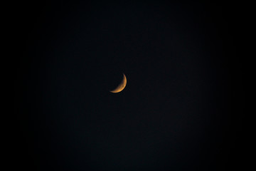 Obraz na płótnie Canvas Half moon on dark black night